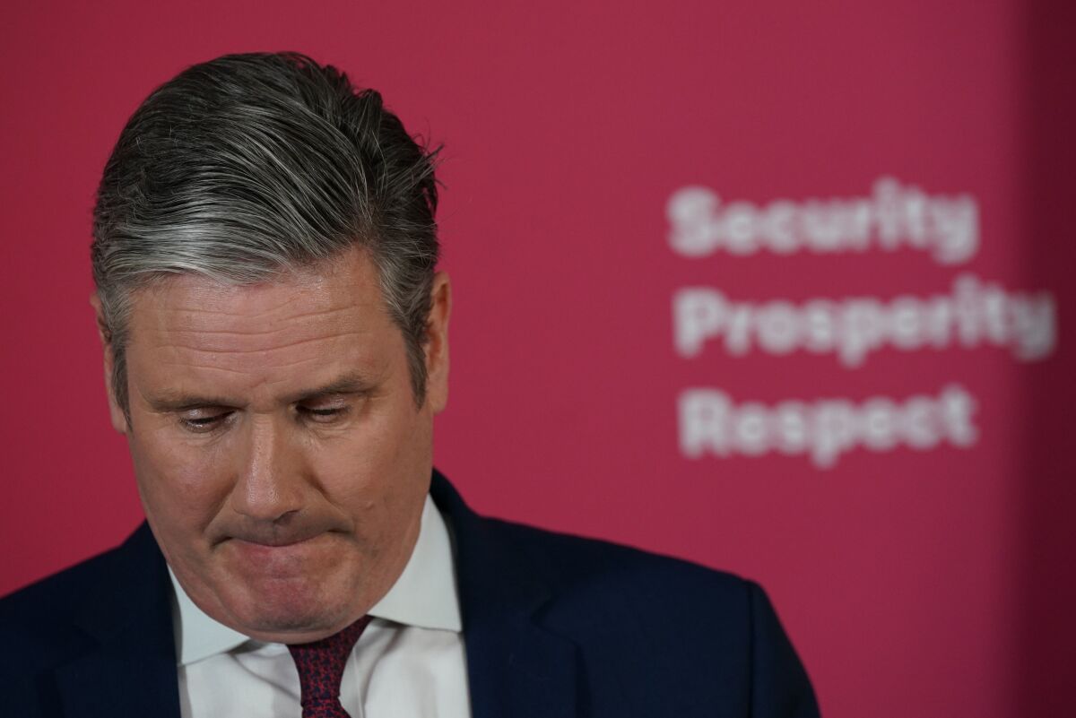 Labour leader Keir Starmer makes a statement at Labour Party headquarters in London, Monday, May 9, 2022. Starmer has said he will do the "right thing" and step down if he is fined by police for breaking Covid regulations rules at Labour Party offices in Durham last year. (Yui Mok/PA via AP)