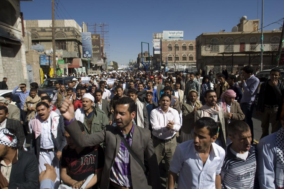 Protesters chant against Houthi Shiite rebels who hold the capital, Sana, as they march on Jan. 24. The U.S. Embassy in Sana has closed to the public because of ongoing security concerns.