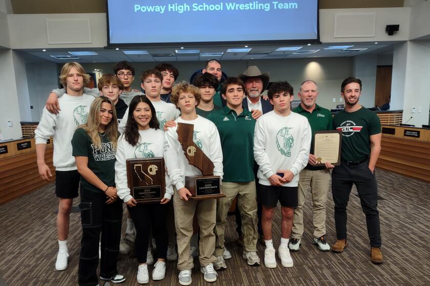 The Poway City Council recognized the boys wrestling team for placing first in the state and girls team for placing third.