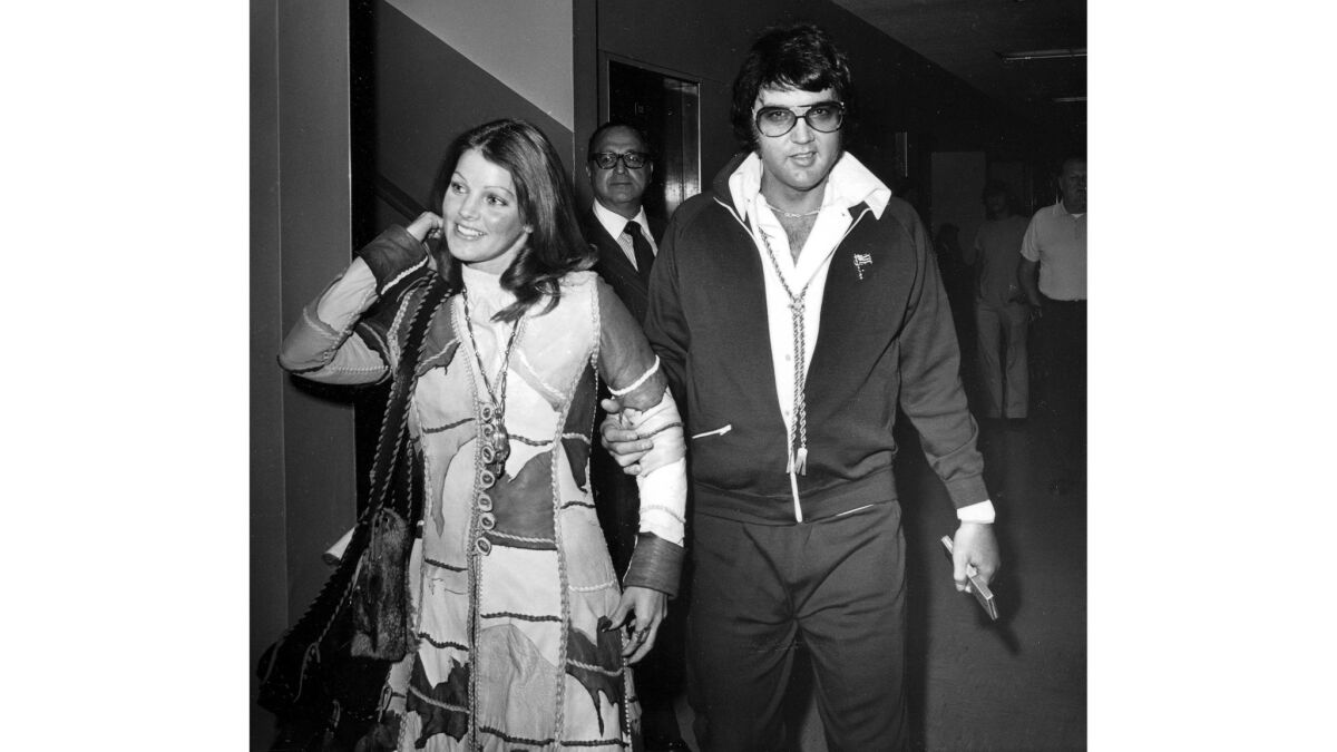 Oct. 9, 1973: Elvis and Priscilla Presley leave Los Angeles County Superior Court in Santa Monica after their divorce is granted by a judge.