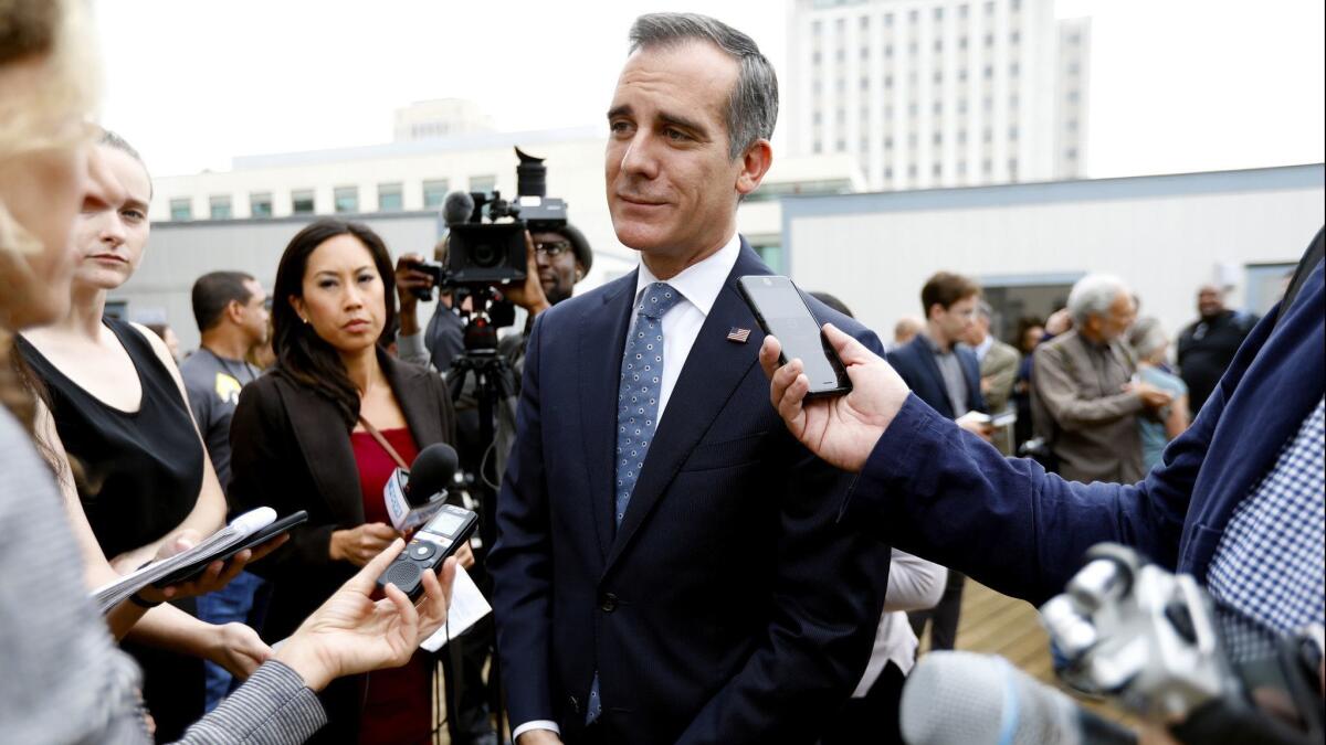Mayor Eric Garcetti takes questions following a press conference in Los Angeles on Sept. 5, 2018.