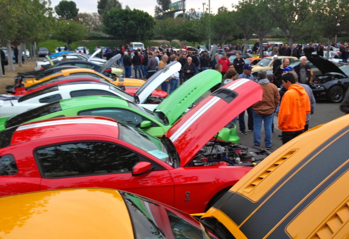 Auto enthusiasts enjoy the last Cars and Coffee event in Irvine.