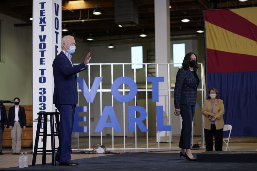 Democratic presidential candidate former Vice President Joe Biden and Democratic vice presidential candidate Sen. Kamala Harris, D-Calif., visit the Carpenters Local Union 1912 in Phoenix, Thursday, Oct. 8, 2020. (AP Photo/Carolyn Kaster)