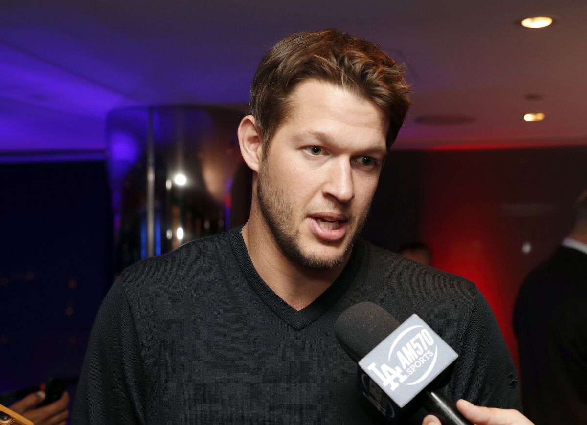Dodgers pitcher Clayton Kershaw talks with reporters during an announcement event at the winter meetings on Dec. 5.