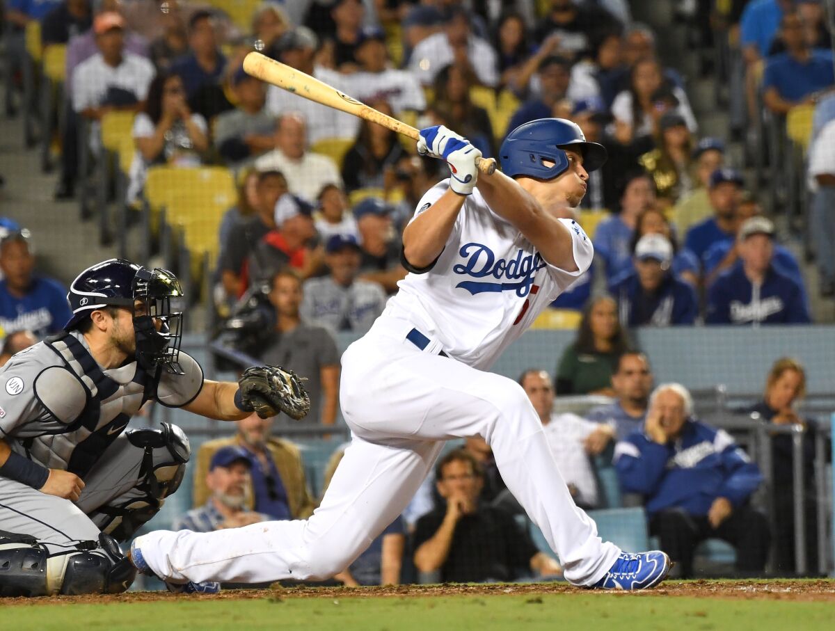 Dodgers shortstop Corey Seager hits a two-run double.