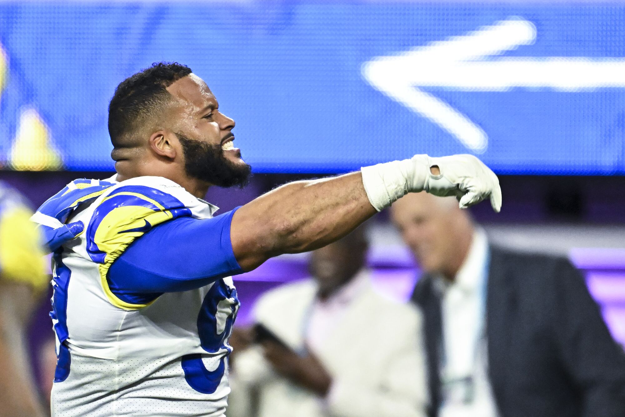 Rams defensive end Aaron Donald celebrates after pressuring Bengals quarterback Joe Burrow.