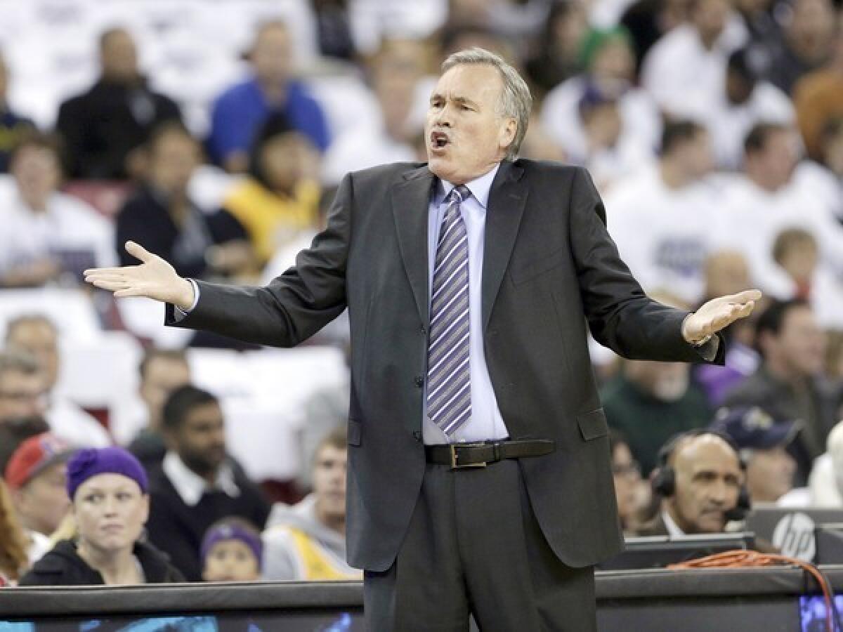 Lakers Coach Mike D'Antoni questions a foul call during a game against Sacramento on Dec. 6.