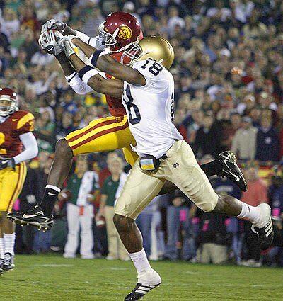 USC receiver Dwayne Jarrett makes a touchdown catch in front of Notre Dame's Chinedum Ndukwe.