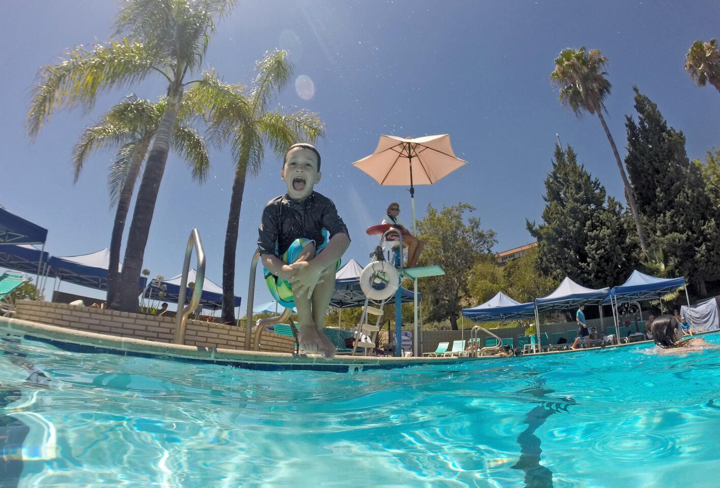Photo Gallery: Pool keeps children cool as temperatures soar