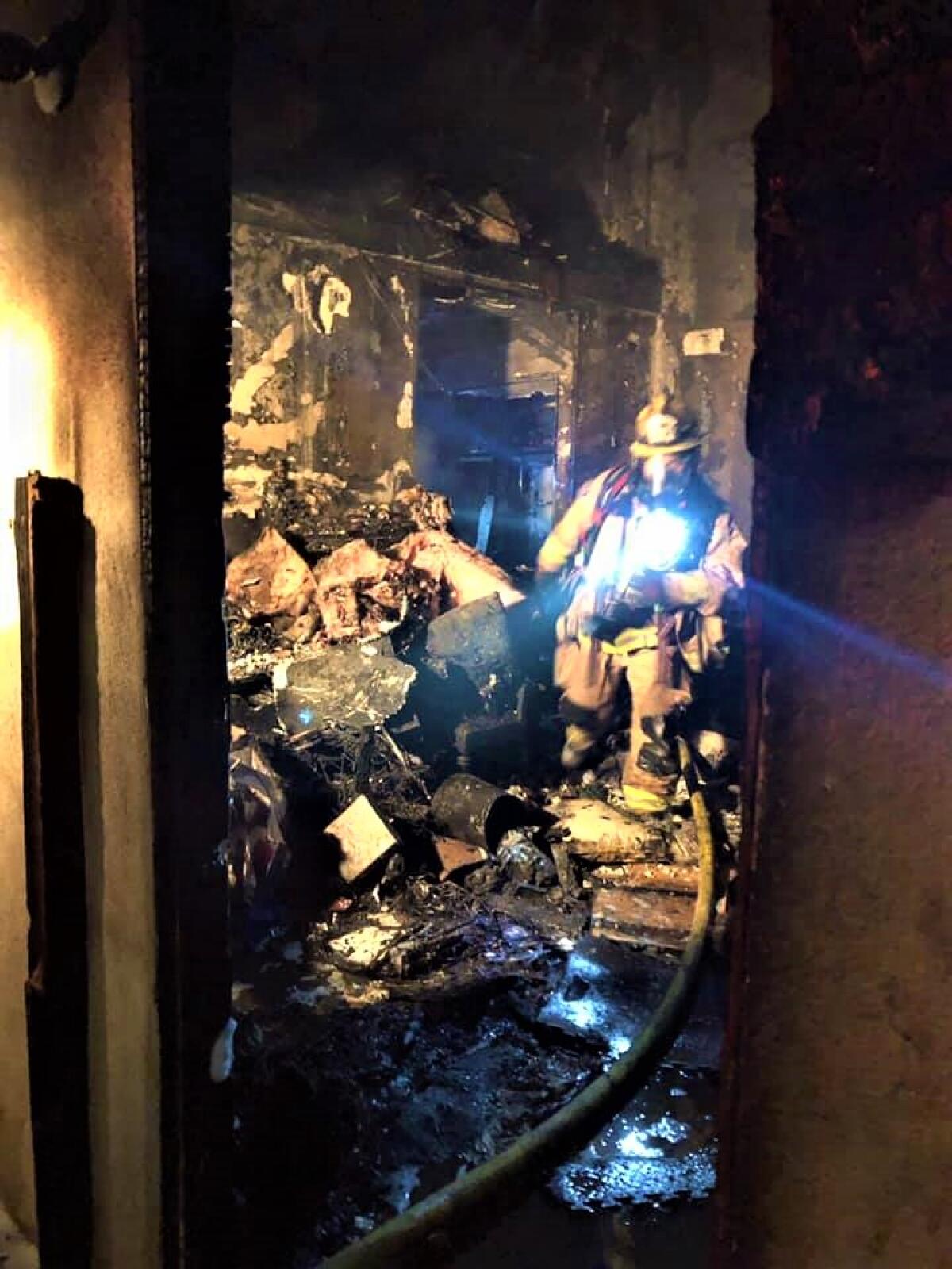 A bedroom at an end-unit apartment on 21st Street in Costa Mesa was heavily damaged by a fire that broke out Saturday night.