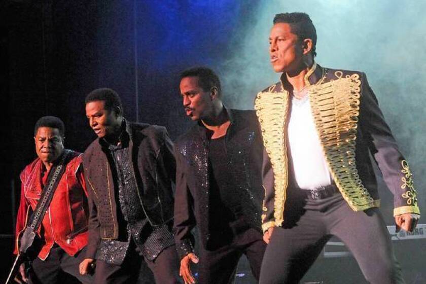 The Jackson 4 -- from left, Tito, Jackie, Marlon and Jermaine -- perform at Bergen Performing Arts Center on June 30, 2012, in Englewood City, N.J.