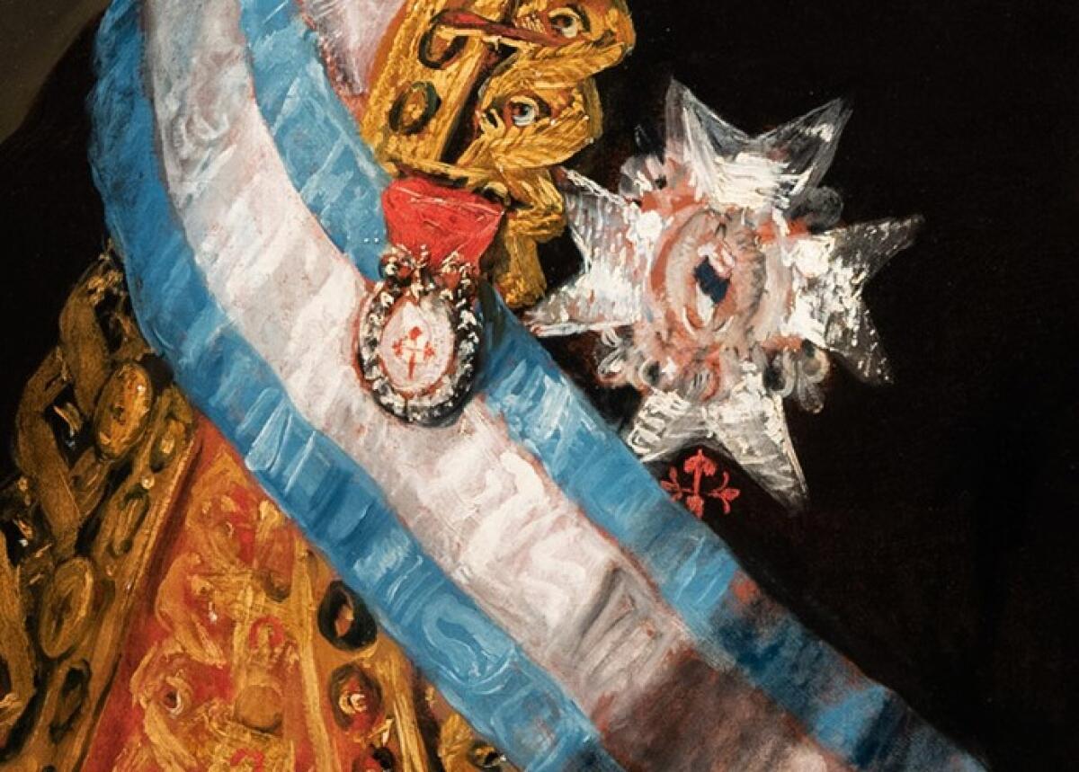 A detail shot of José Antonio Caballero's royal hardware and blue and white sash.