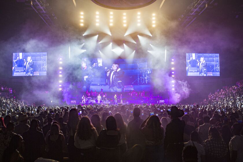Grupo Firme performs on stage at Pechanga Arena on August 14, 2021 in San Diego, California.