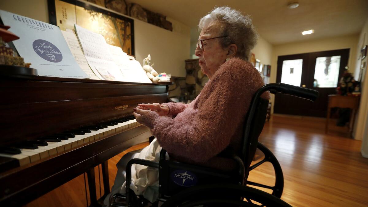 Hazel "Happi" Hicks, at her piano in her home in La Canada Flintridge.