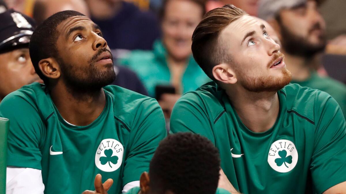 Kyrie Irving, left, and Gordon Hayward are now co-stars for the Boston Celtics.