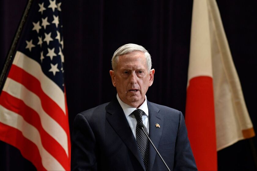 Secretary of Defense James N. Mattis addresses reporters at the defense ministry in Tokyo on Feb. 4.