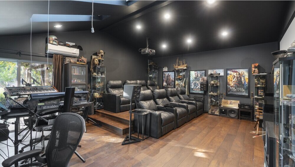 The half-acre estate includes a ranch-style home and soundproof recording studio/screening room surrounded by herb gardens and fruit trees.