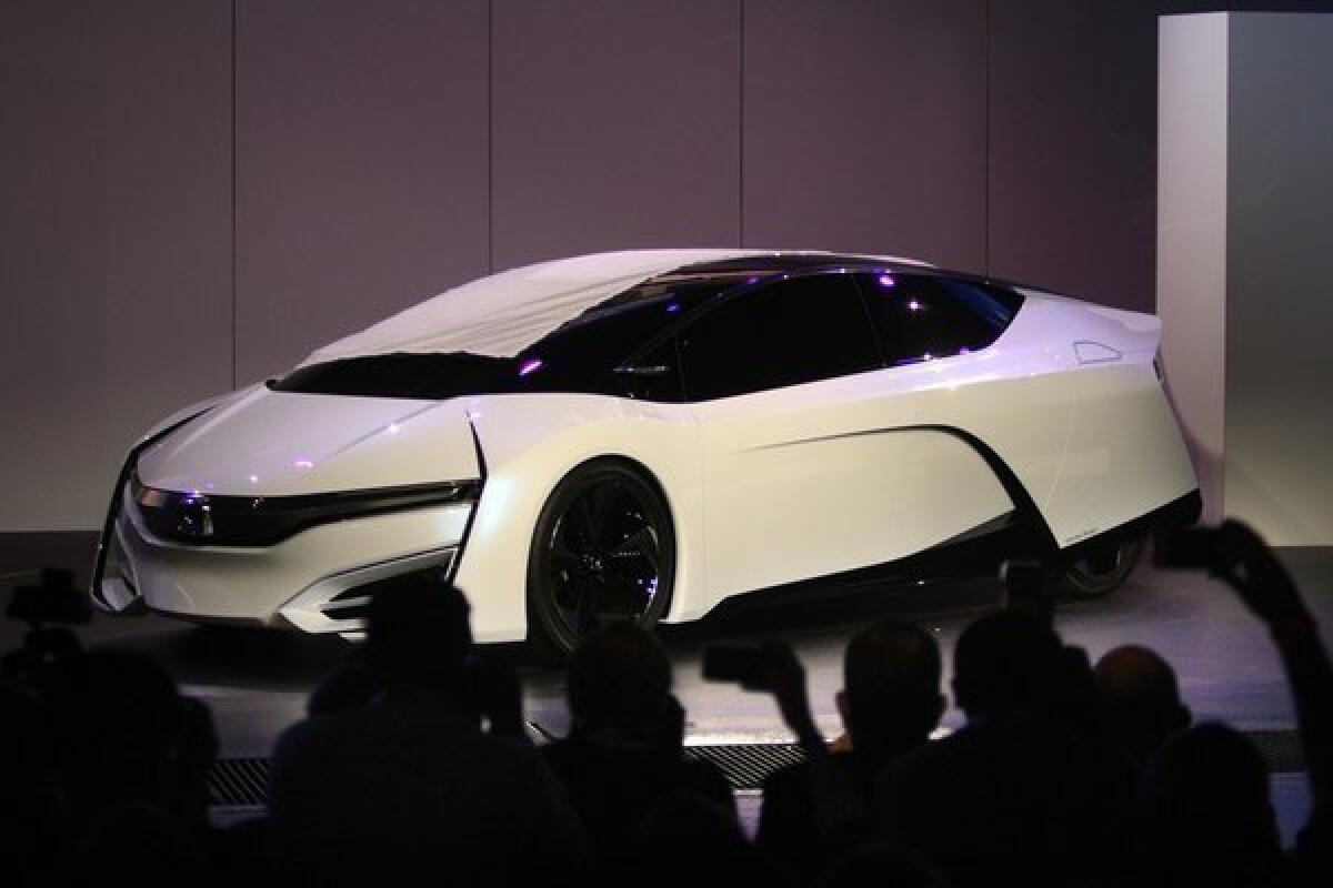 Honda unveils its FCEV concept car at the 2013 L.A. Auto Show.