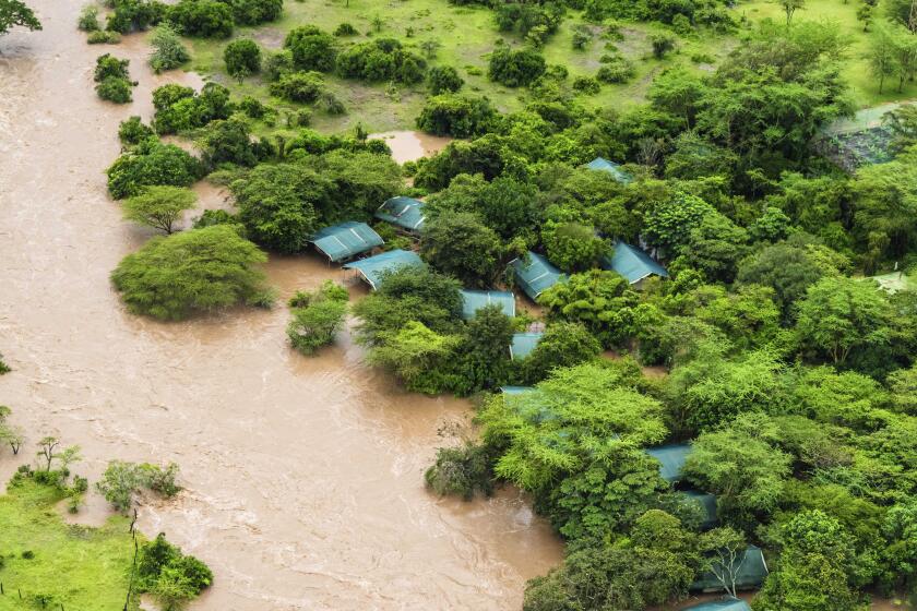 A lodge is seen in the flooded Maasai Mara National Reserve, which left dozens of tourists stranded in Narok County, Kenya, Wednesday, May 1, 2024. Kenya, along with other parts of East Africa, has been overwhelmed by flooding. (AP Photo/Bobby Neptune)