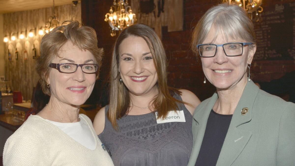 Leeron Tal Dvir, center, who chaired the fundraiser, welcomes City Councilwoman Sharon Springer, left, and Vice Mayor Emily Gabel-Luddy to Urban Press Winery.