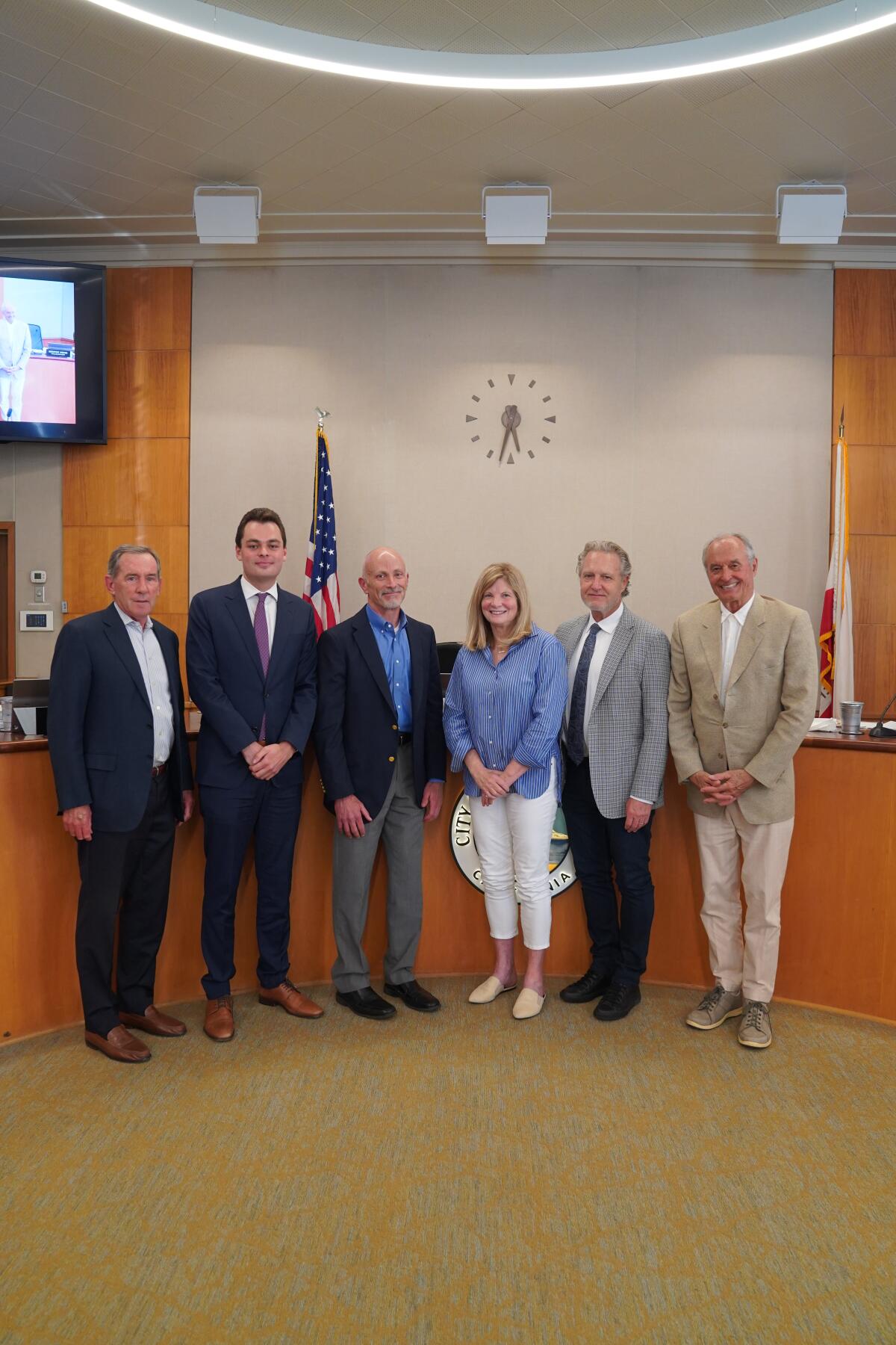 The Laguna Beach City Council poses with incoming City Manager Dave Kiff, third from left.