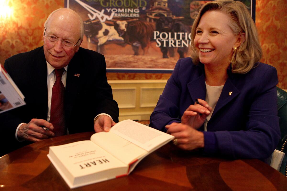 Former Vice President Dick Cheney with his daughter, Liz, as they talk about his book in Cheyenne, Wyo.