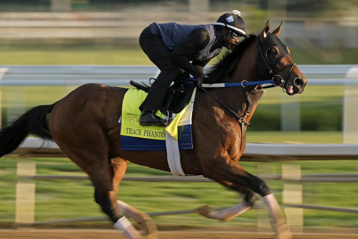 Kentucky Derby entrant Track Phantom works out at Churchill Downs 