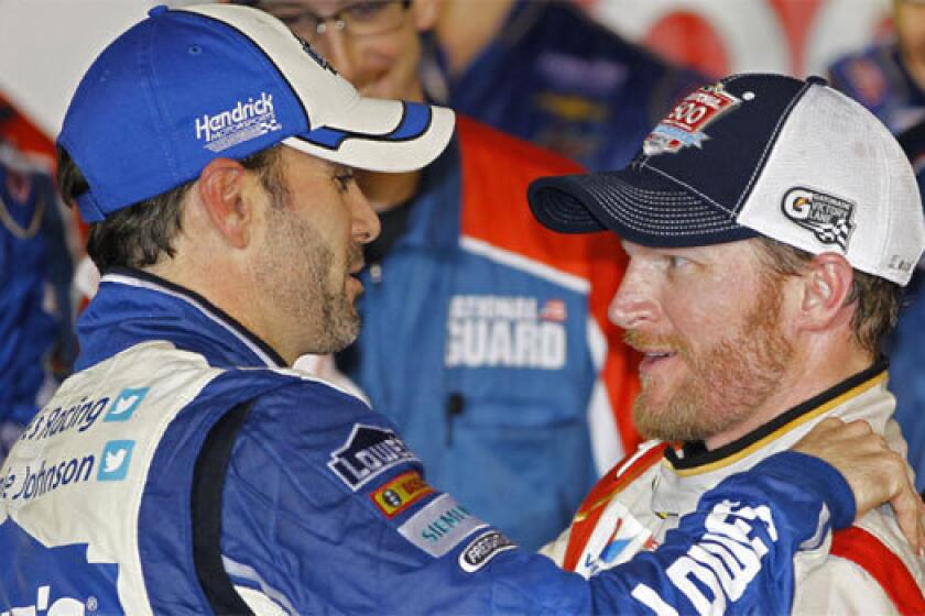 City National Bank will be looking to do business with Indy and National Hot Rod Assn. racers as well as businesses supporting NASCAR's stock-car racing operations. Above, Jimmie Johnson, left, congratulates Daytona 500 winner Dale Earnhardt Jr. in February.