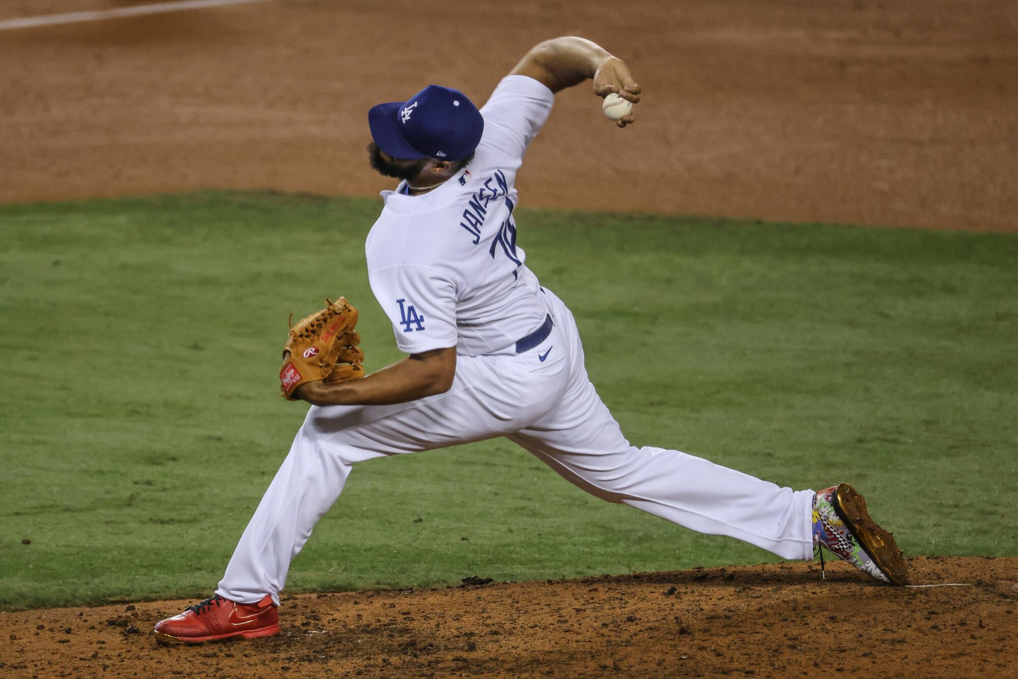 Dodgers closer Kenley Jansen delivers a pitch during the ninth inning of a 4-2 win over the Milwaukee Brewers.