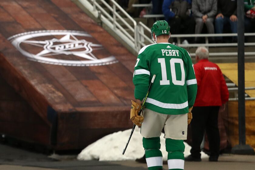 Stars right wing Corey Perry leaves after receiving a game misconduct after elbowing Predators defenseman Ryan Ellis on Jan. 1 during the first period of the 2020 Bridgestone NHL Winter Classic.