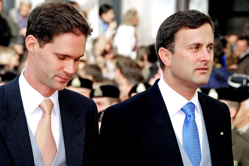Luxembourg City Mayor Xavier Bettel, right, and partner Gauthier Destenay attend the wedding of Luxembourg's Prince Guillaume and Countess Stephanie de Lannoy of Belgium at the Cathedral of Our Lady of Luxembourg on Oct. 20, 2012.