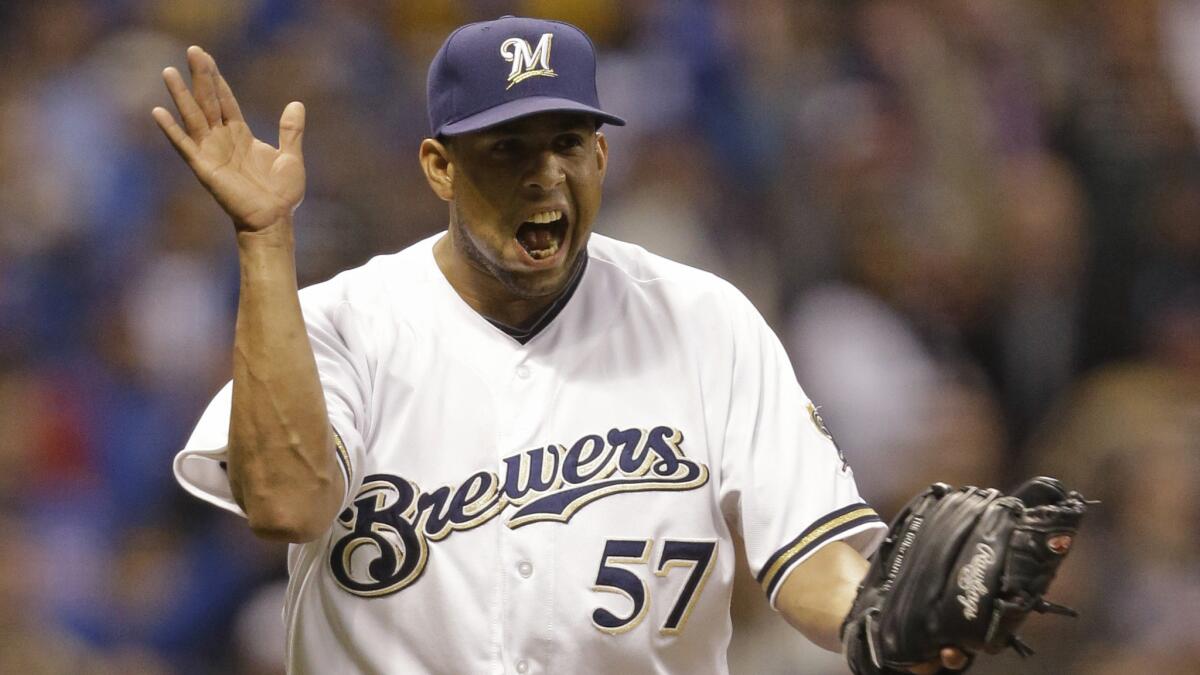 Milwaukee Brewers reliever Francisco Rodriguez celebrates after the final out of an April 2014 game against the Chicago Cubs.