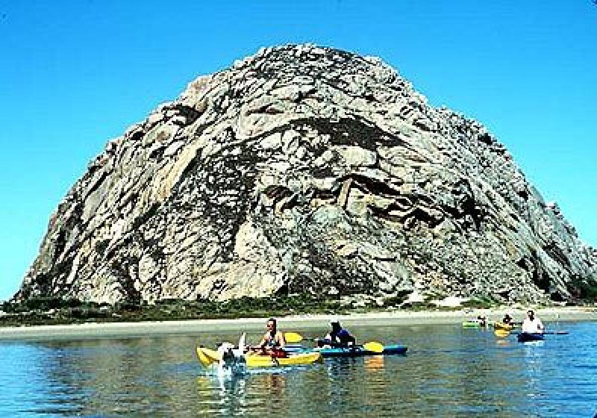 Morro Rock, a peregrine falcon reserve, is a well-known sight along the coast of San Luis Obispo County.