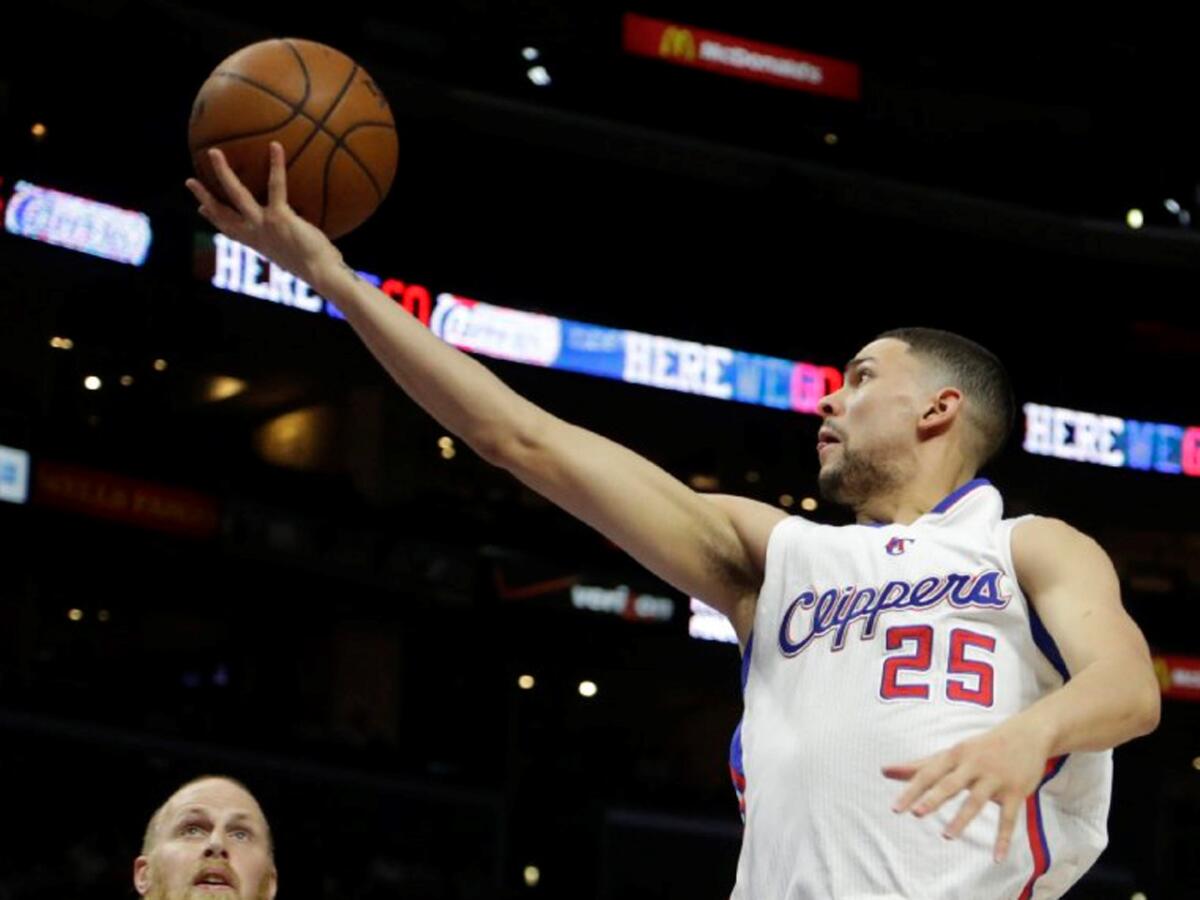 Clippers point guard Austin Rivers goes up for a finger roll layup in the first half.
