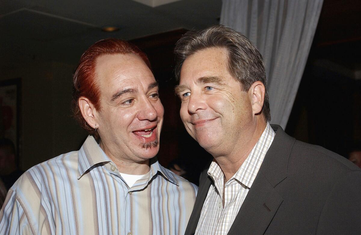 John Lafia and Beau Bridges  attend a 2004 after-party for the miniseries '10.5.'