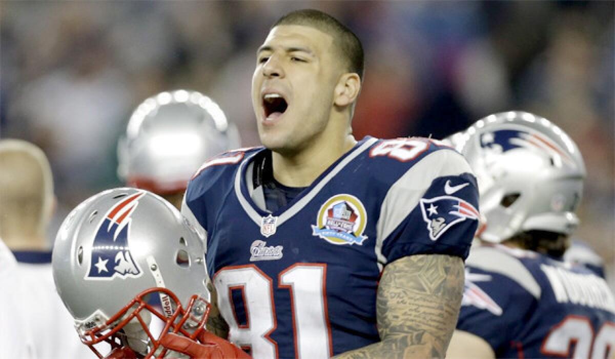 Police have visited the home of Patriots tight end Aaron Hernandez twice in connection with the investigation of the death of Odin Lloyd, according to reports.