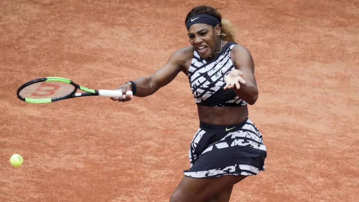 Serena Williams plays a forehand return to Vitalia Diatchenko during their first-round match at the French Open on May 27.