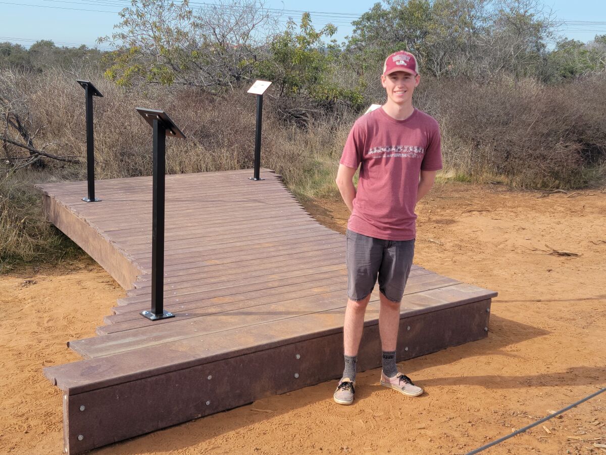 Eagle Scout candidate Dylan Kearse in front of the new viewing deck in the Carmel Mountain Preserve.