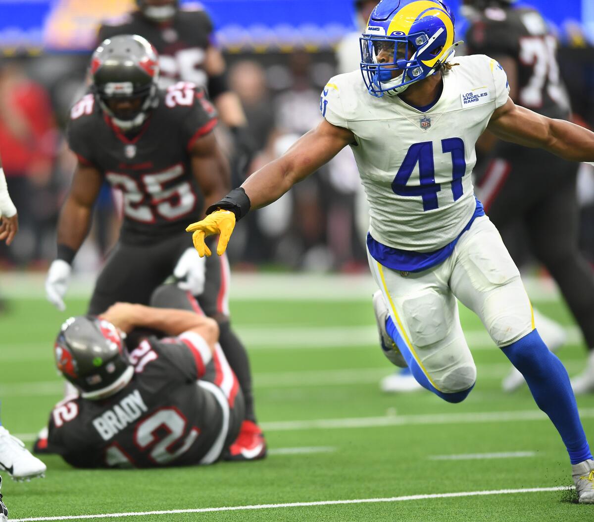 Rams linebacker Kenny Young celebrates after sacking Buccaneers quarterback Tom Brady in the third quarter.