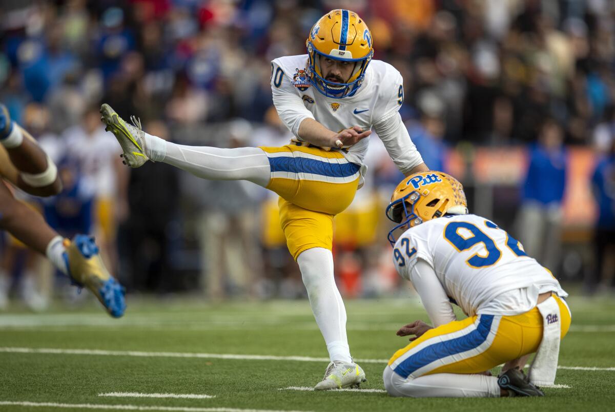 Pittsburgh's Ben Sauls kicks a 47-yard field goal to lift the Panthers to victory over UCLA in the Sun Bowl.