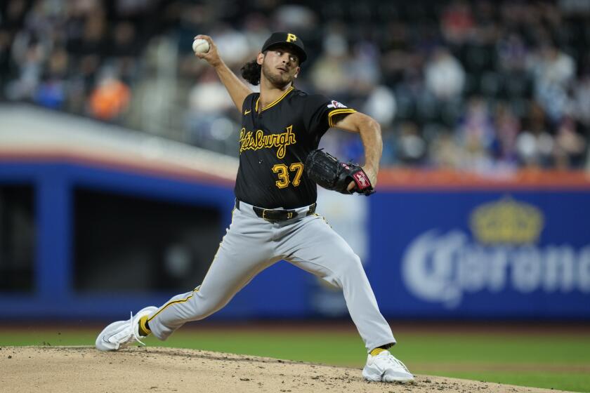 Pittsburgh Pirates pitcher Jared Jones throws during the second inning of a baseball game against the New York Mets at Citi Field, Tuesday, April 16, 2024, in New York. (AP Photo/Seth Wenig)