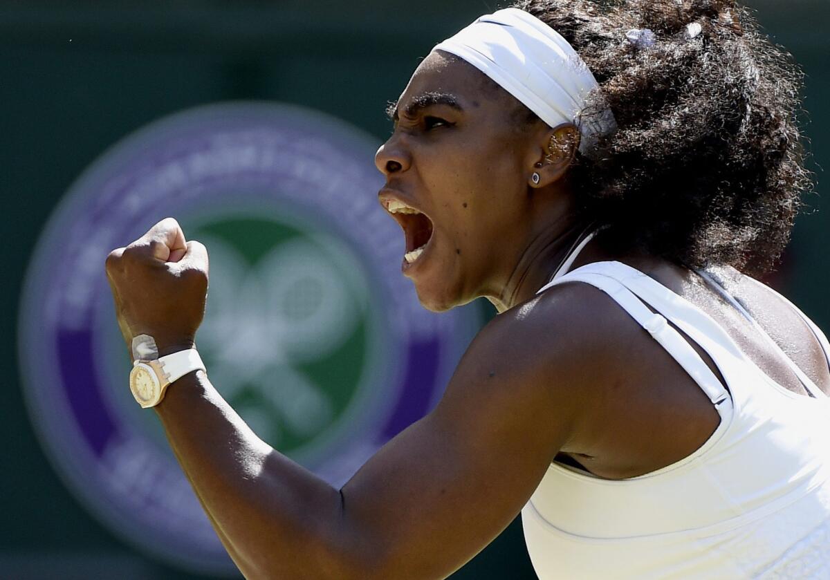 Serena Williams reacts during a match against Garbine Muguruza during the Wimbledon finals in July.