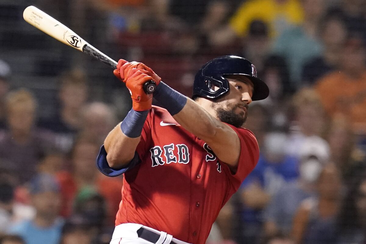 Boston Red Sox's Kyle Schwarber watches his lineout in the fifth inning of the team's baseball game against the Baltimore Orioles at Fenway Park, Friday, Aug. 13, 2021, in Boston. (AP Photo/Elise Amendola)