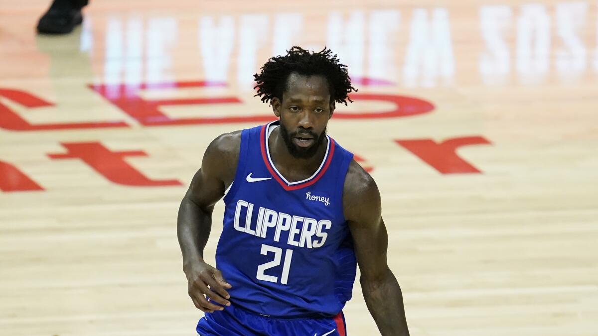 Clippers guard Patrick Beverley controls the ball against the Sacramento Kings.