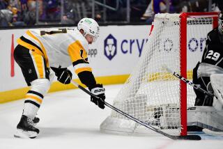 LOS ANGELES, CA - NOVEMBER 9: Bryan Rust #17 of the Pittsburgh Penguins shoots.