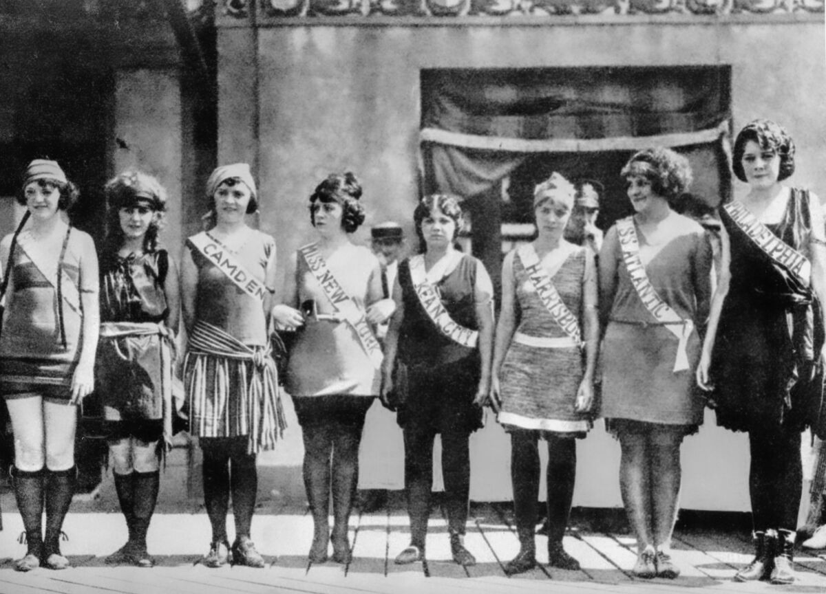 FILE - Contestants in the first Miss America pageant line up for the judges in Atlantic City, N.J., in September 1921. The competition is marking its 100th anniversary on Thursday, Dec. 16, 2021, having managed to maintain a complicated spot in American culture with a questionable relevancy. (AP Photo/File)