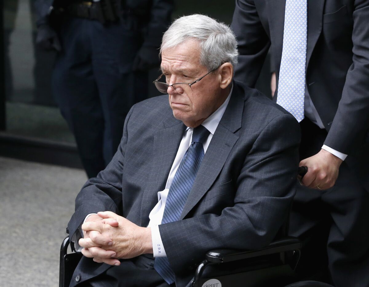 FILE - In this April 27, 2016, file photo, former U.S. House Speaker Dennis Hastert departs the federal courthouse in Chicago after his sentencing on federal banking charges. On Wednesday, Sept. 15, 2021, lawyers say Hastert and a man who accused him of child sexual abuse reached a tentative out-of-court settlement over Hastert’s refusal to pay the remaining $1.8 million of a verbal agreement to pay $3.5 million in hush money in exchange for the man’s silence. (AP Photo/Charles Rex Arbogast, File)