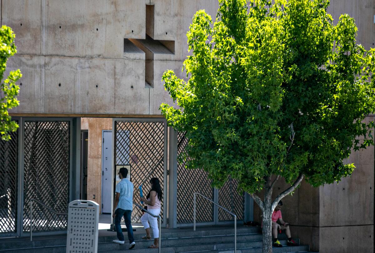 People attend Mass at the Cathedral of Our Lady of the Angels on Sunday after the Supreme Court's decision