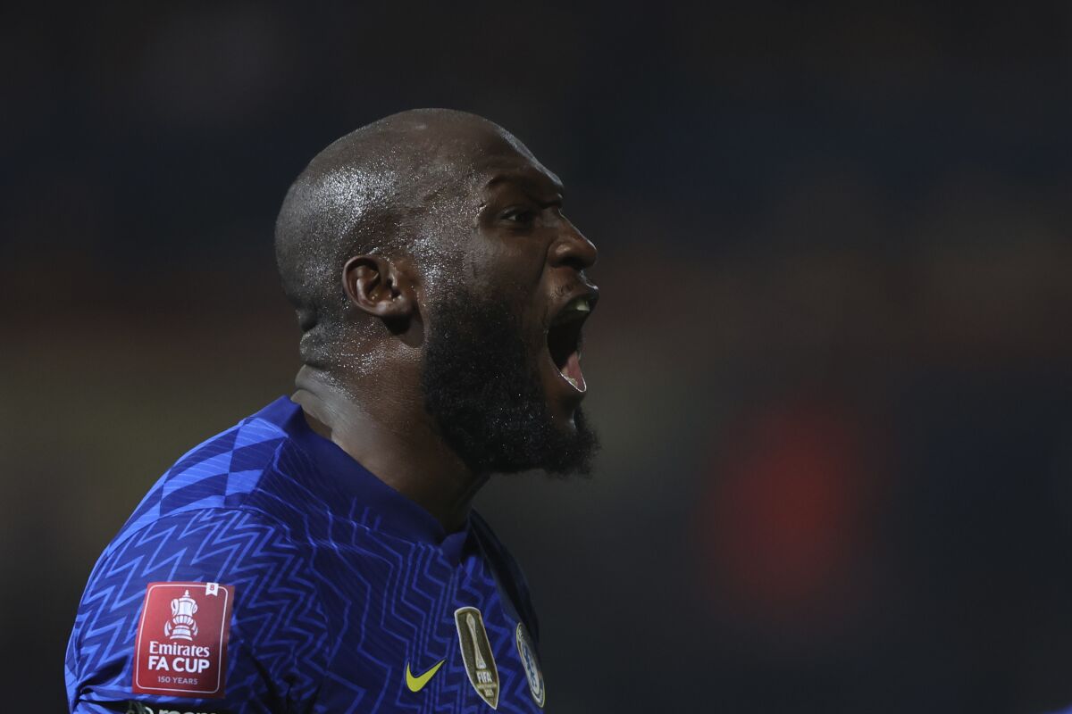 Chelsea's Romelu Lukaku celebrates after scoring his side's third goal during the FA Cup fifth round soccer match between Luton Town and Chelsea at Kenilworth Road in Luton, England, Wednesday, March 2, 2022. (AP Photo/Ian Walton)