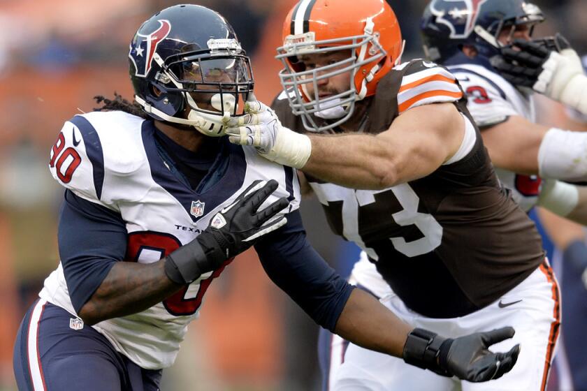 Texans linebacker Jadeveon Clowney tries to get past Browns tackle Joe Thomas (73) during their game on Nov. 16.